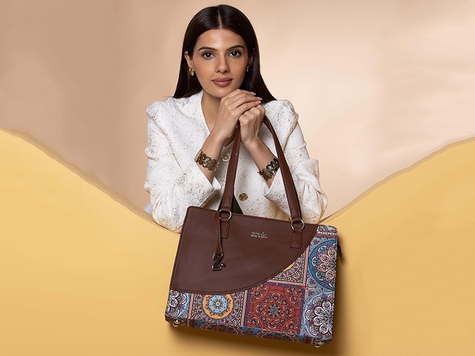 Best buy, efdbestbuy, www.efdbestbuy.com, efd best buy, efd bestbuy, efd-bestbuy, efd-best-buy, shopping advisor, efd shopping advisor, efd best buy shopping advisor, consult before buy, efd consult before buy, efd best buy consult before buy, Upgrade your everyday work style with the ZOUK Women’s Office Essential Bag, a premium handcrafted tote designed for modern professionals who value fashion and functionality. Made from high-quality jute fabric combined with durable vegan leather, this eco-friendly tote bag offers a stylish, sustainable alternative to traditional leather handbags. The spacious main compartment easily fits your laptop, documents, diary, wallet, makeup pouch, and daily essentials, making it perfect for office, college, meetings, and travel. Featuring sturdy double handles and a comfortable shoulder strap, this women’s tote bag ensures easy carrying throughout the day. The elegant ethnic-inspired design adds a unique touch to formal and casual outfits alike. Lightweight yet durable, this jute and vegan leather handbag is ideal for working women looking for a practical office bag, designer tote for daily use, stylish shoulder bag for women, eco-friendly handbag, or spacious work tote that combines sophistication with convenience.